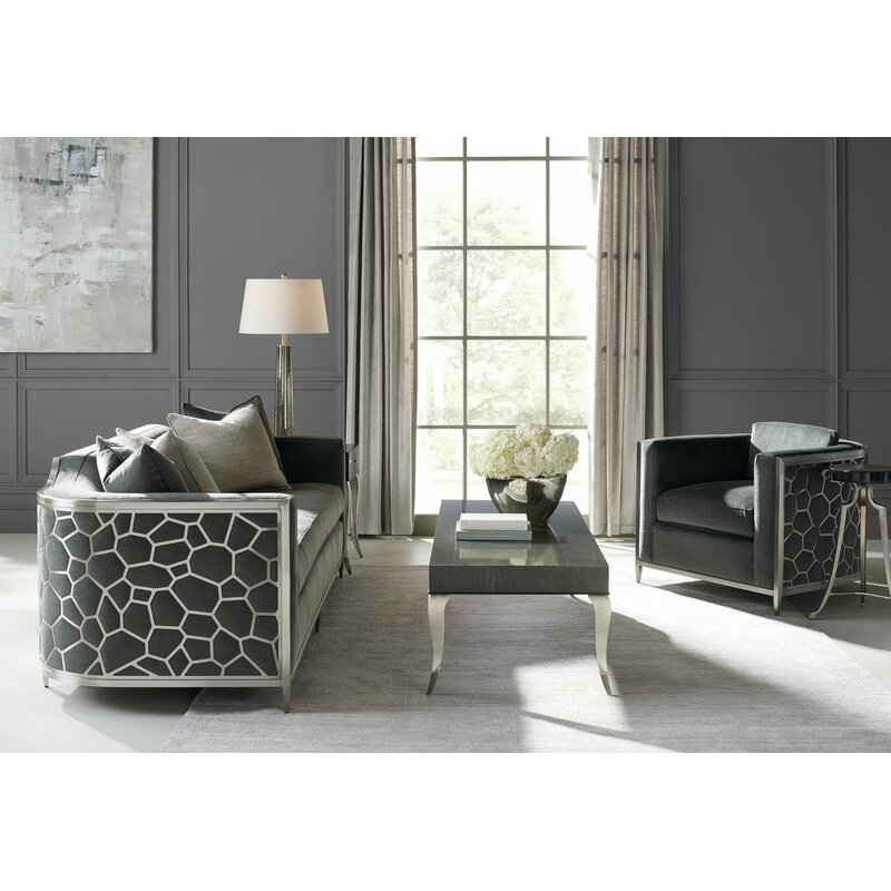 金属包裹的可配置客厅设计独特，足以围绕一个房间。它的灵感外观夸耀定制设计的穿孔金属框架与现代蜂巢图案完成…